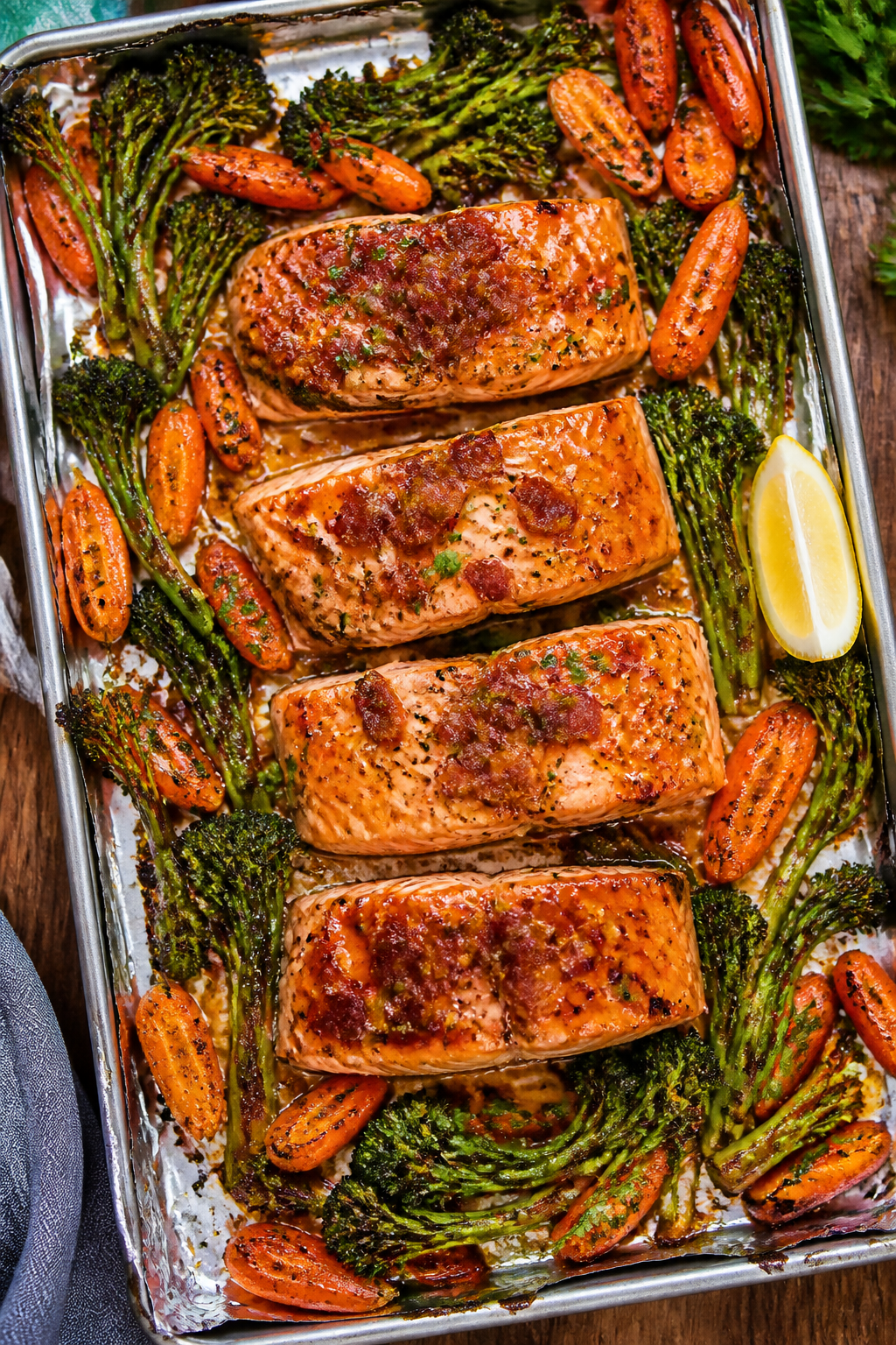 Tasty top view (overhead): Sheet-pan dinner variation—overhead shot of baked salmon fillets glazed
