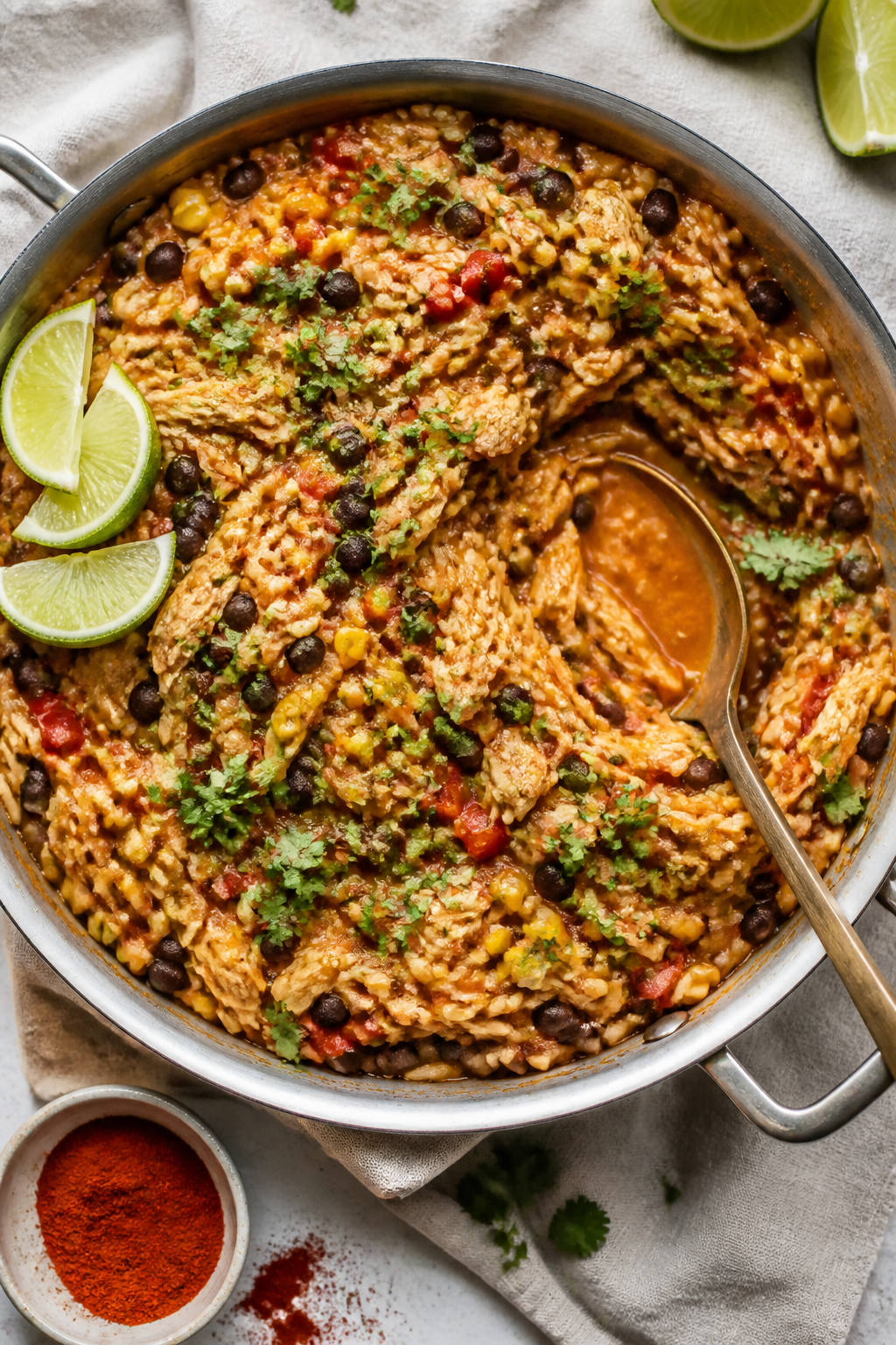 Tasty top view: Overhead shot of Healthy Mexican Chicken Orzo just finished in the pan—glistening 